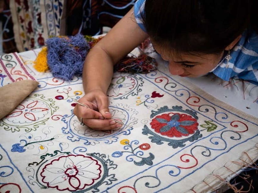Legends and Crafts: Suzani Masterclass & Cultural Immersion - A garden meal with non, salad, and palov