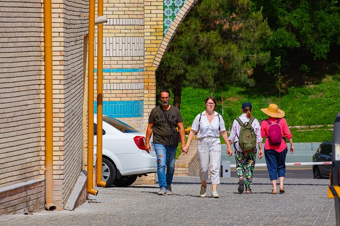 Tashkent Walking & Food Tour: Highlights + Local Flavors - Chorsu Bazaar: bread, sweets, and local shopping
